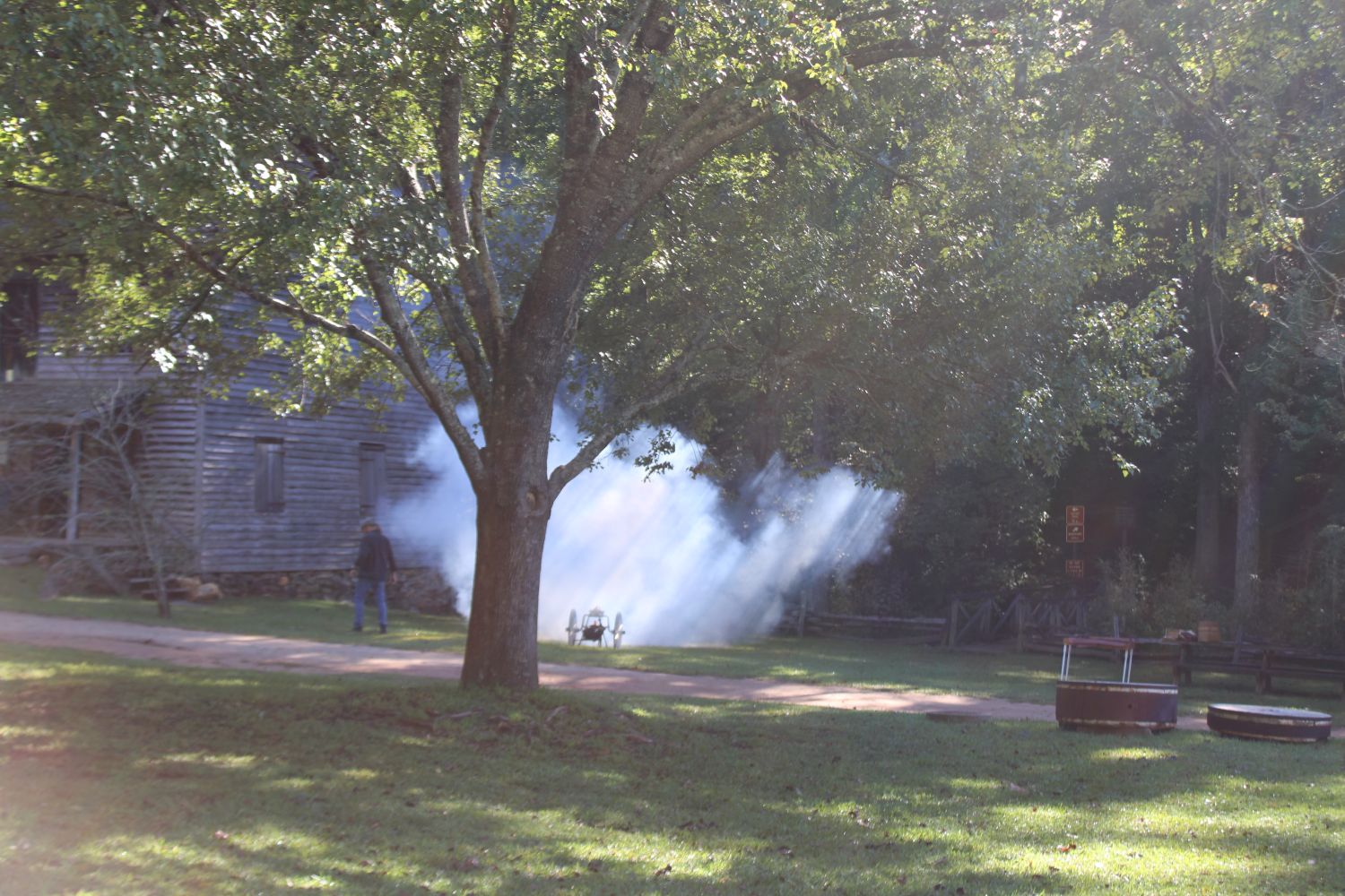 Robert Watson fires a late 19th Century cannon. (Photo by Karen Brewer, The Pickens County Chronicle)