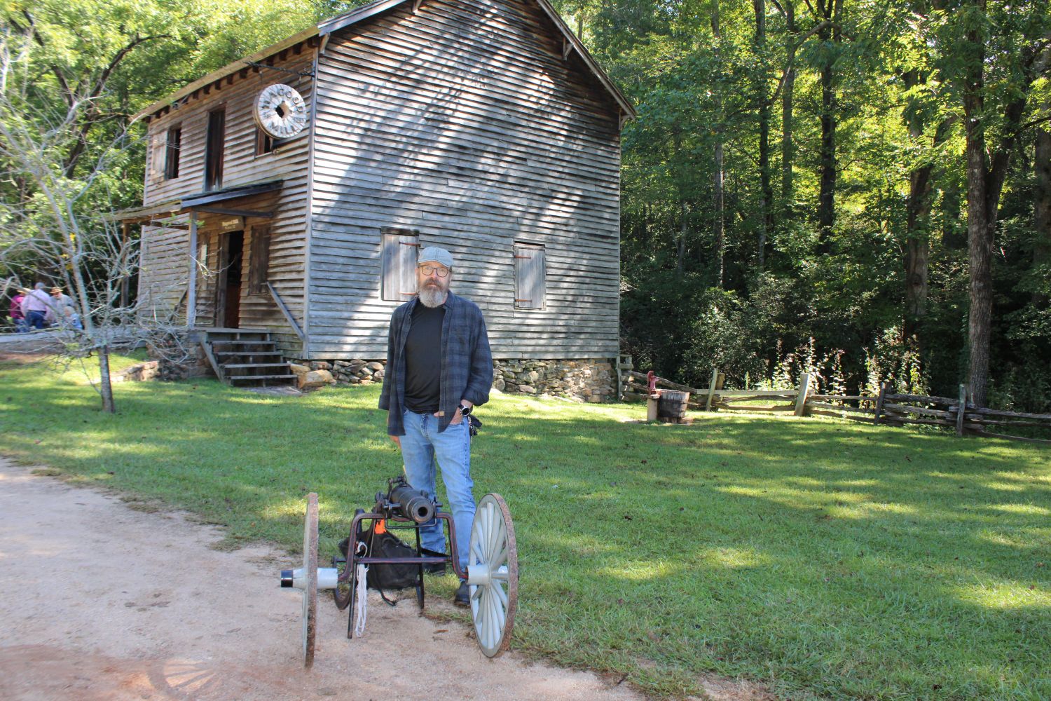 Robert Watson is pictured with his late 19th Century cannon. (Photo by Karen Brewer, The Pickens County Chronicle)