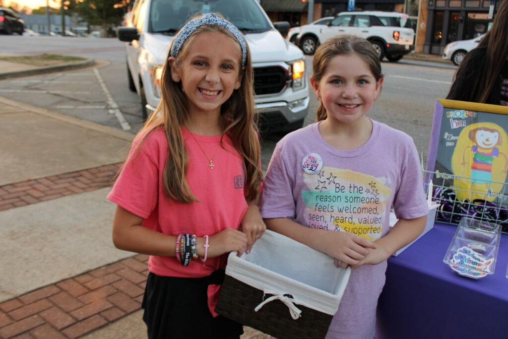 Vega Griffin and Emberly Nicholson prior to the start of the candlelight vigil ceremony on Thursday, October 1, 2026 at the Pickens County Courthouse (Photo by Karen Brewer, The Pickens County Chronicle)
